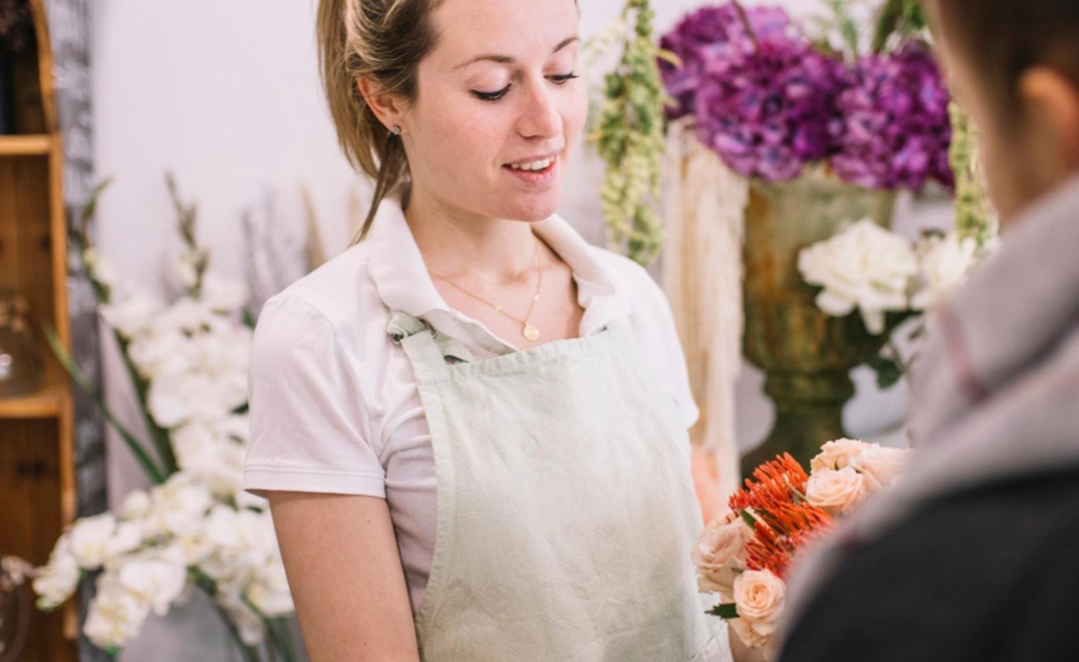 Students working on design projects in modern workspace